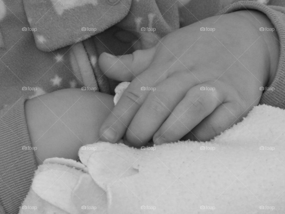 Precious little hands.