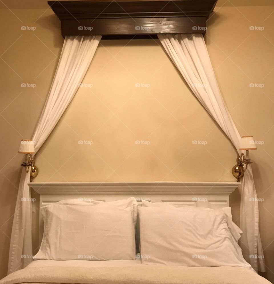 An elegant, yet incredibly cozy bed awaits a turn down and its snuggler(s) to nestle in for the evening.