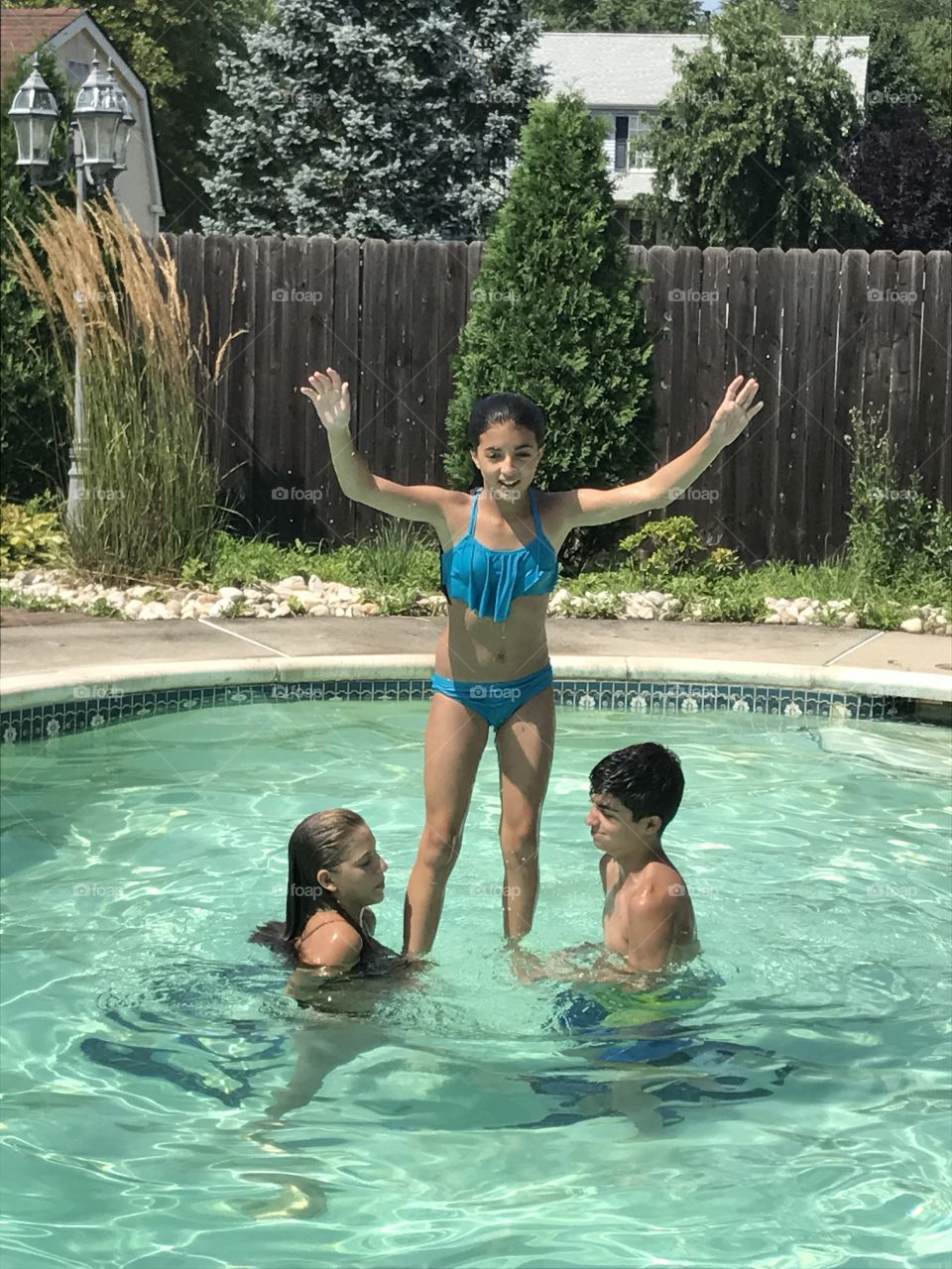 Kids playing in the pool