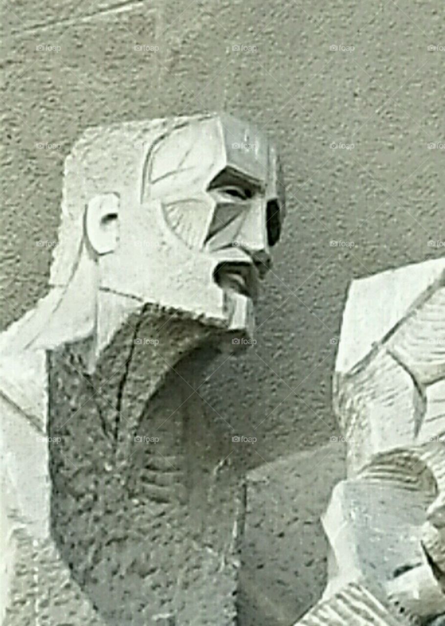 Gaudi image. Antonio Gaudi's image snuck into the sculptures on the Passion side of the Sagrada Familia.