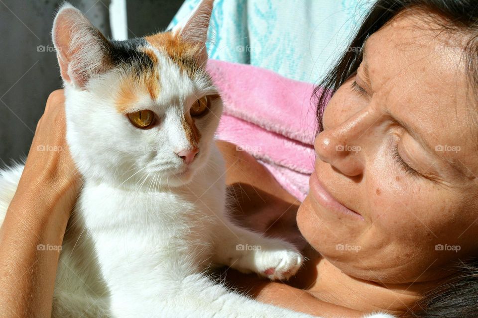 woman and cat pet happy