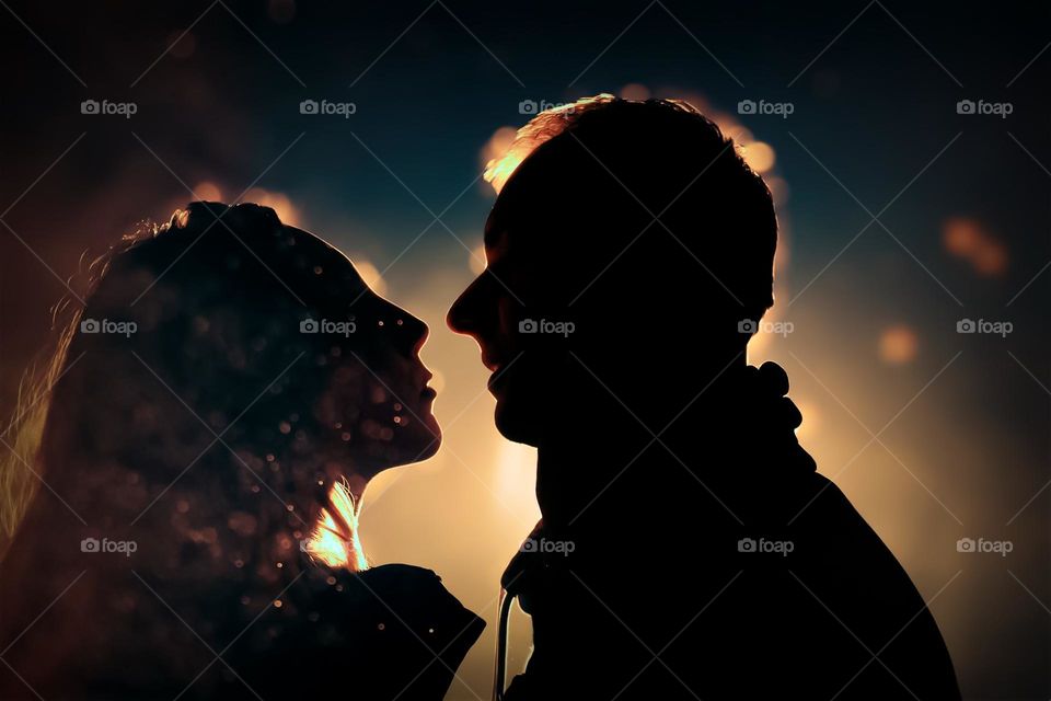 Silhouette of couple in the dark 