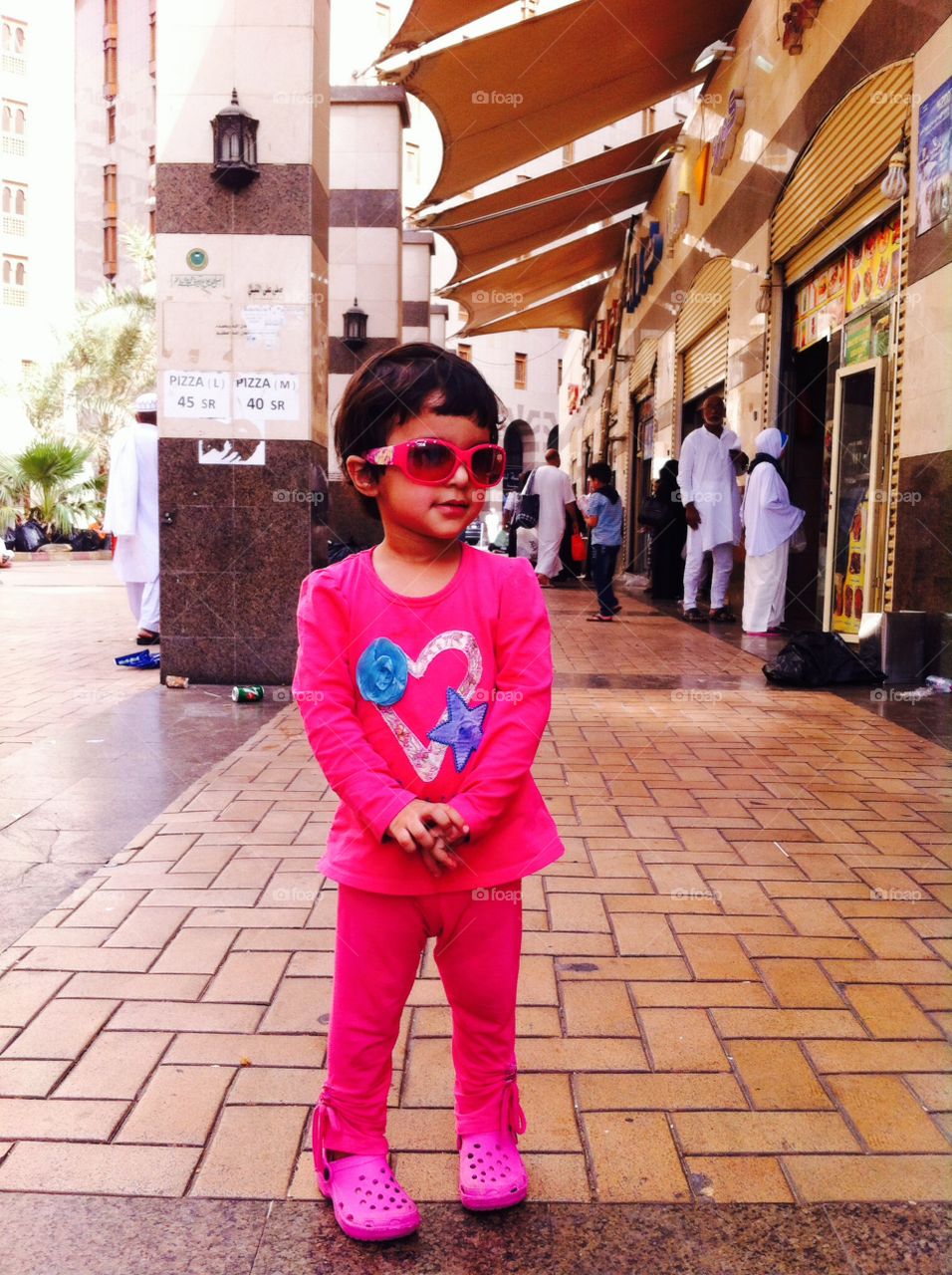 My little sister in front of Food Court, In Madina City, Saudi Arabia