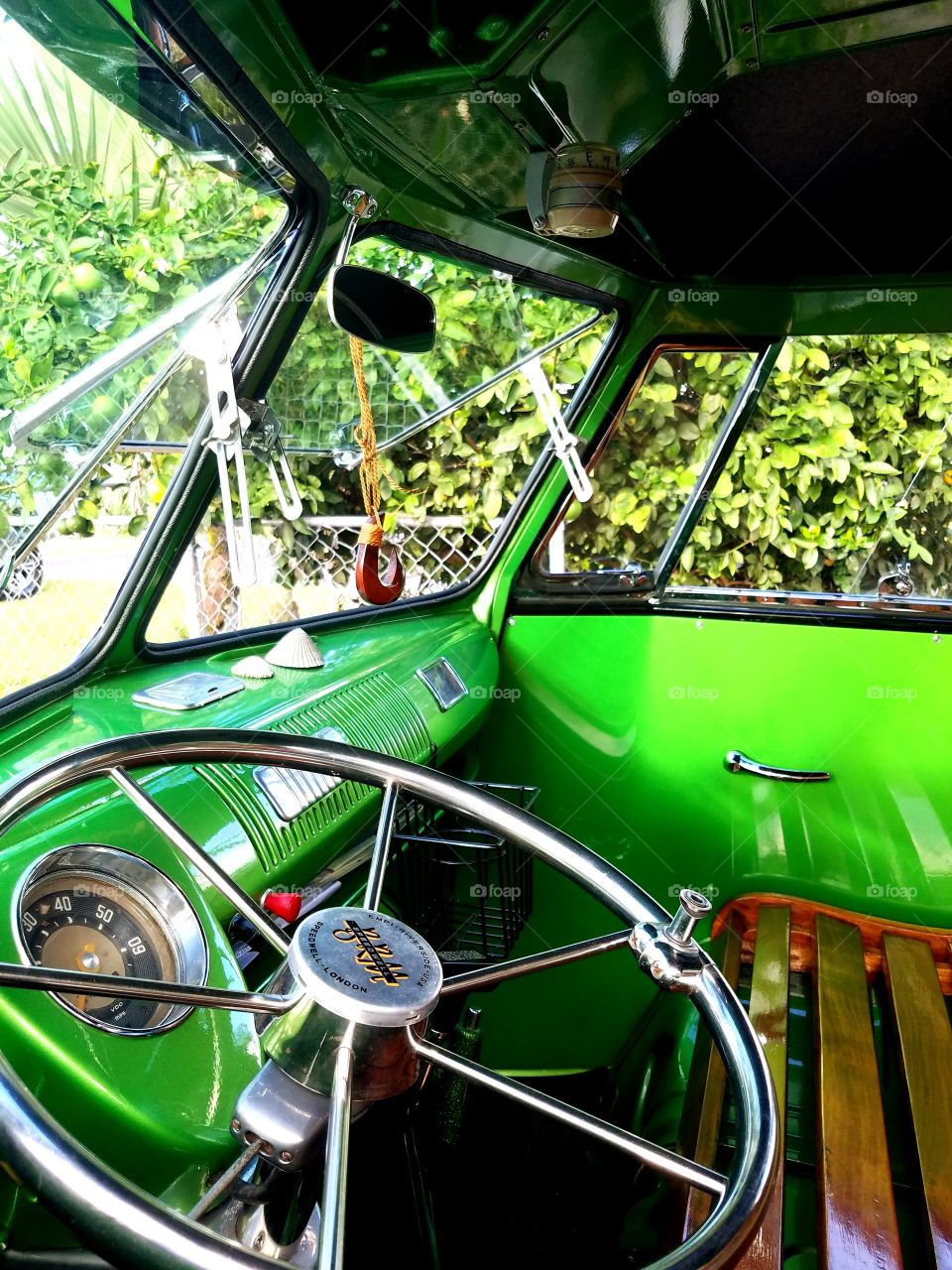 Volkswagon pick up truck with a quick glimpse inside. Restored with Hawaii's infamous Koa tree