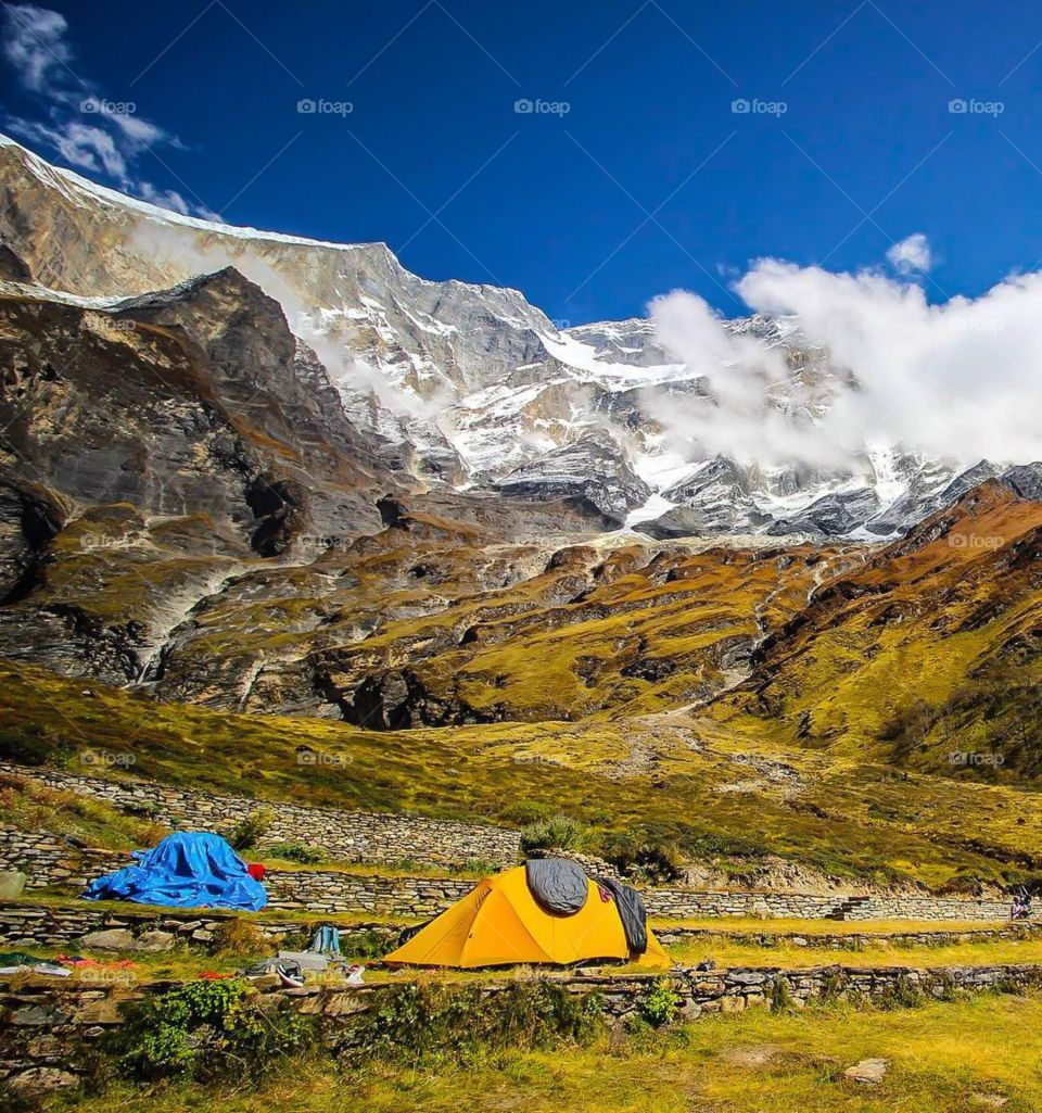 A perfect view of our campsite at Italian Base Camp. Dhaulagiri 1 (8,127 m) rises above in the background. Photo taken on the Dhaulagiri Circuit Trek in Nepal.
