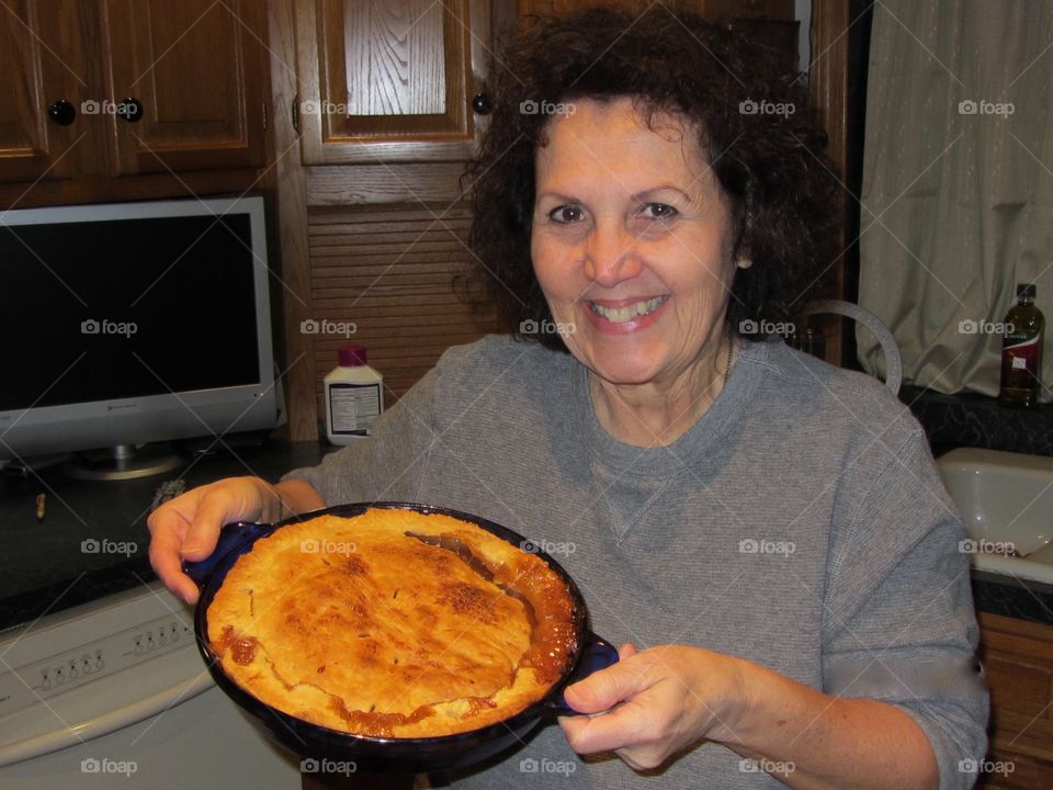 Woman holding food in hand