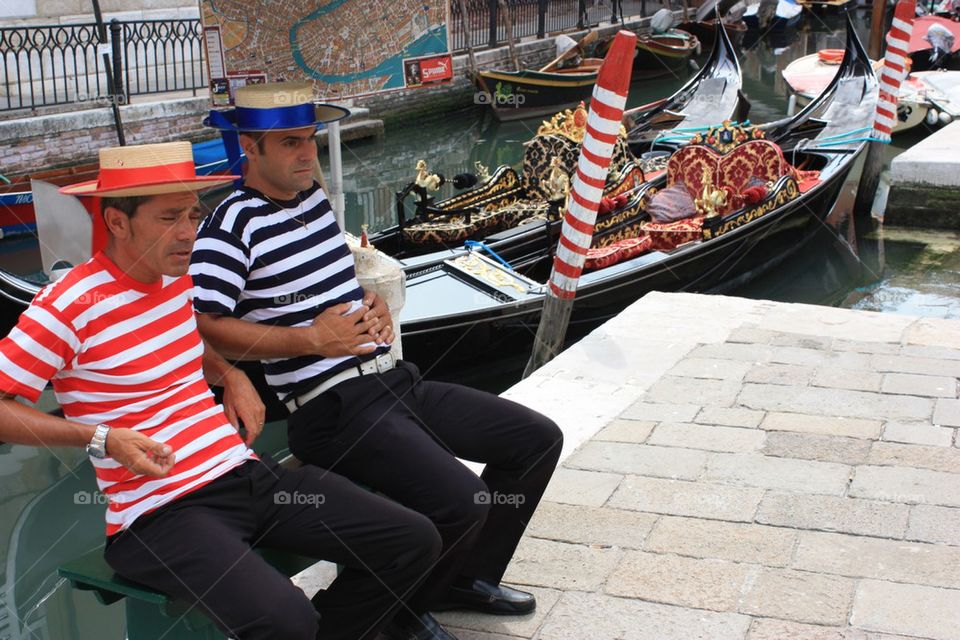 Two gondoliers 