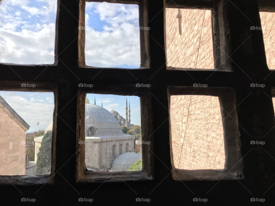 Blue mosque through a window 