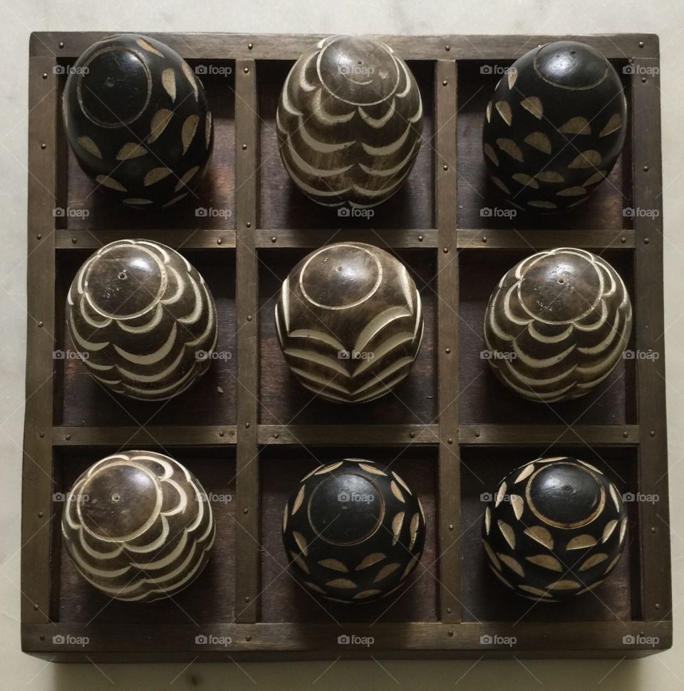 Abstract decoration of wooden spheres with various designs