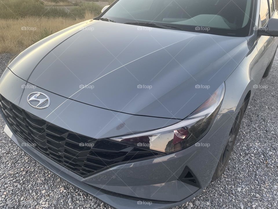 A grey Hyundai Elantra car. 