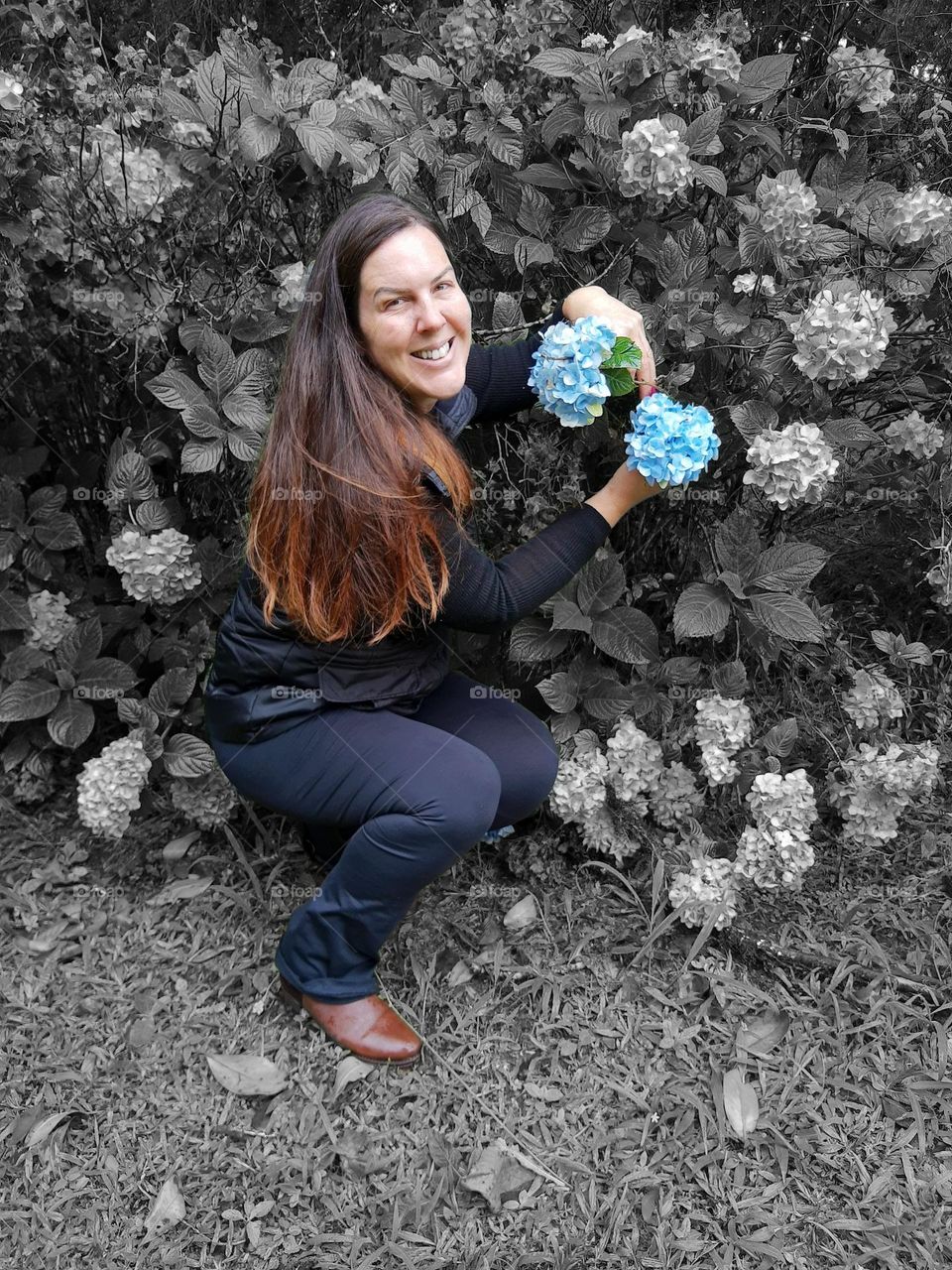 woman with blue hydrangea