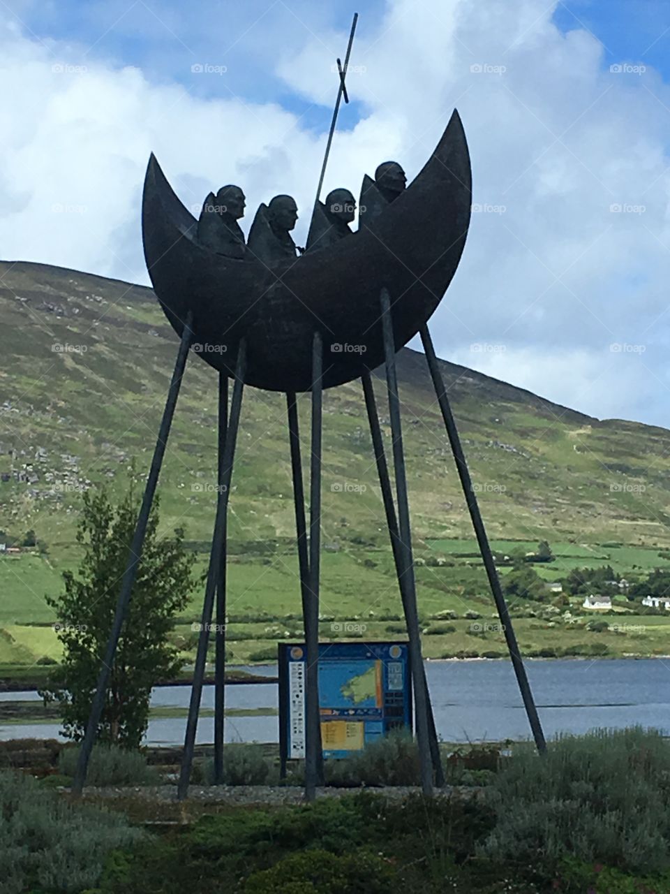 Four monks in a boat