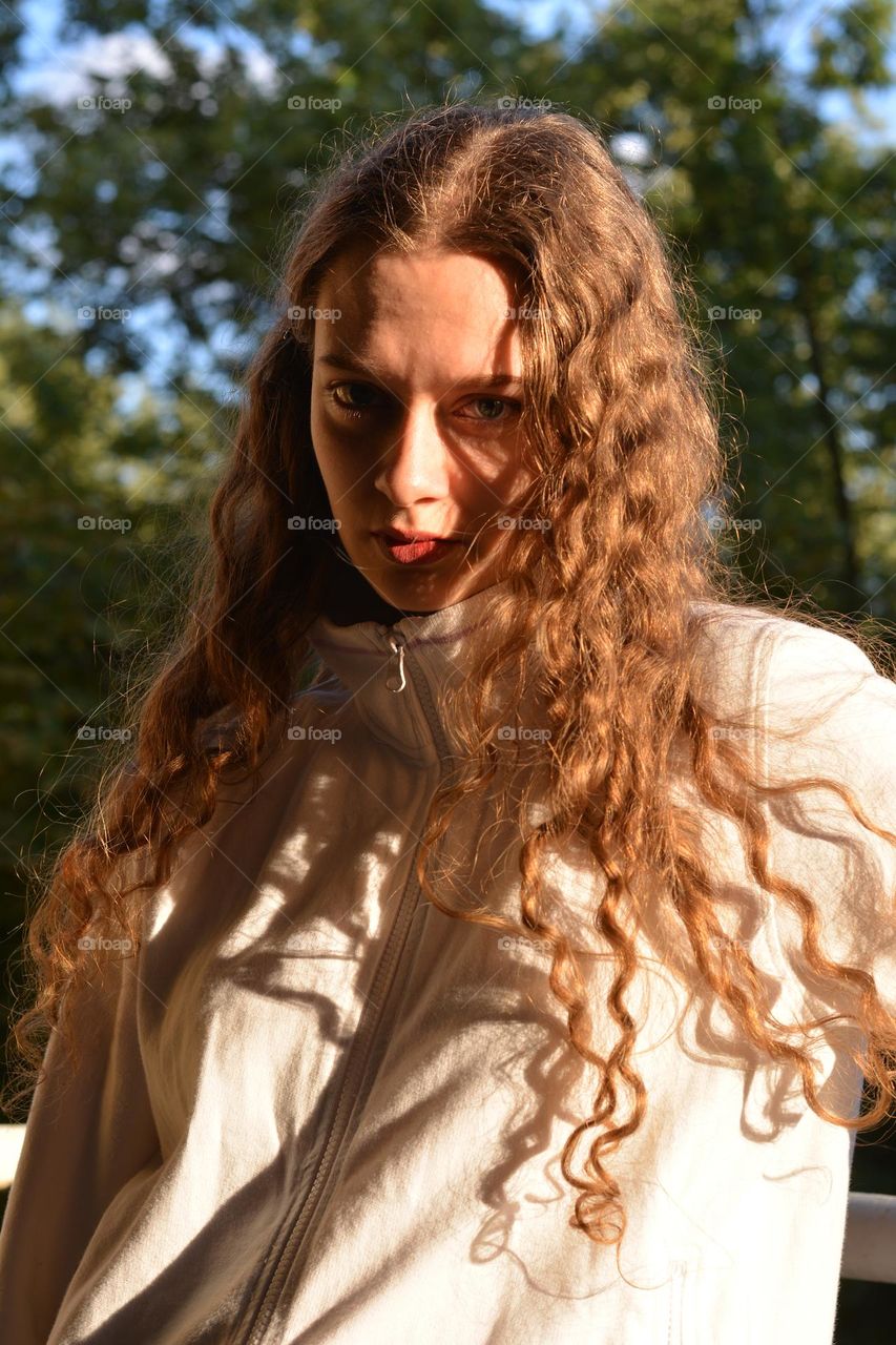 young girl beautiful portrait in sunlight