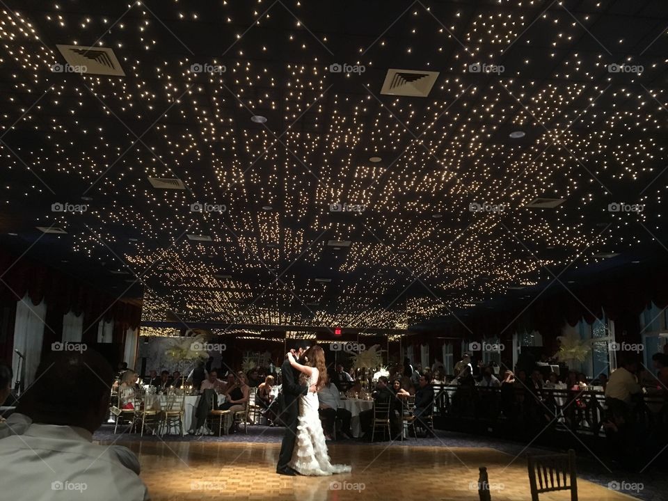 The bride and grooms first dance at a wedding reception held at the Miami Beach Spa and Resort Hotel. 