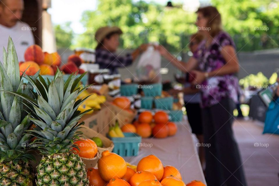 Farmers market with fresh fruit & vegetables on a nice sunny summer day