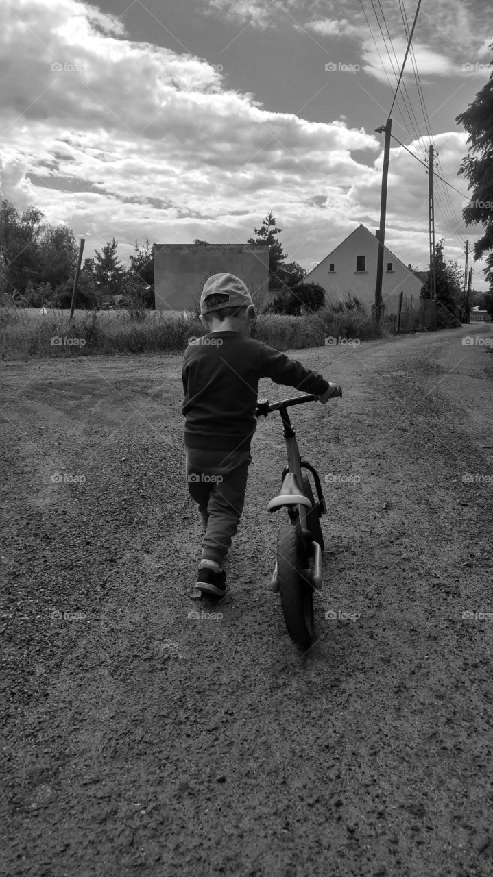 child with a bicycle