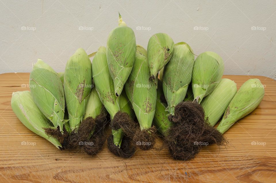 Corns On Wooden Table