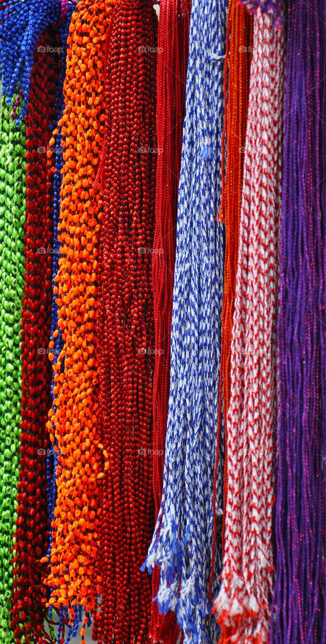 colorful threads in the market stall