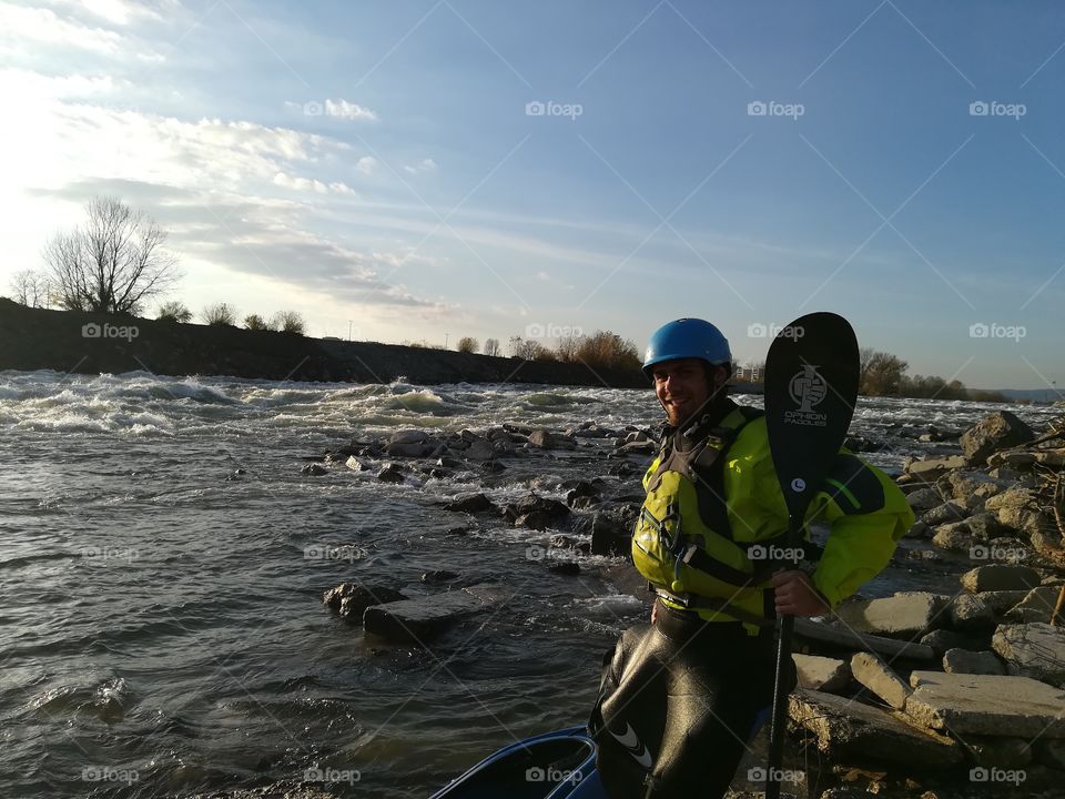 Kayaking river withewater