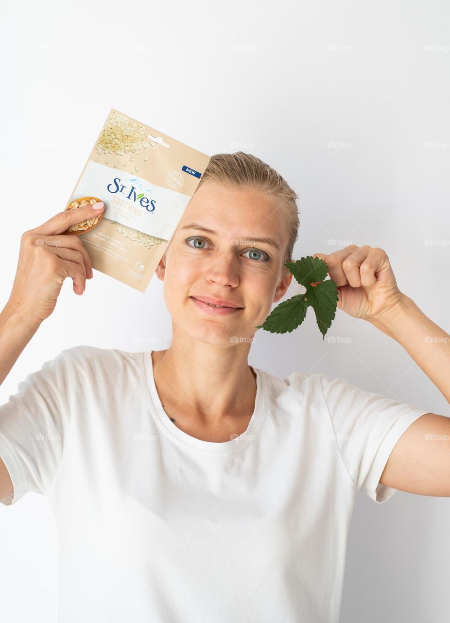 woman hands holding beauty products