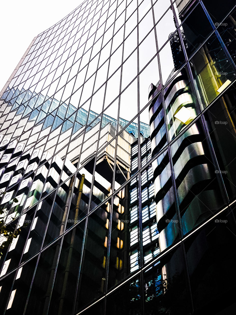 Lloyd's building reflected across the street