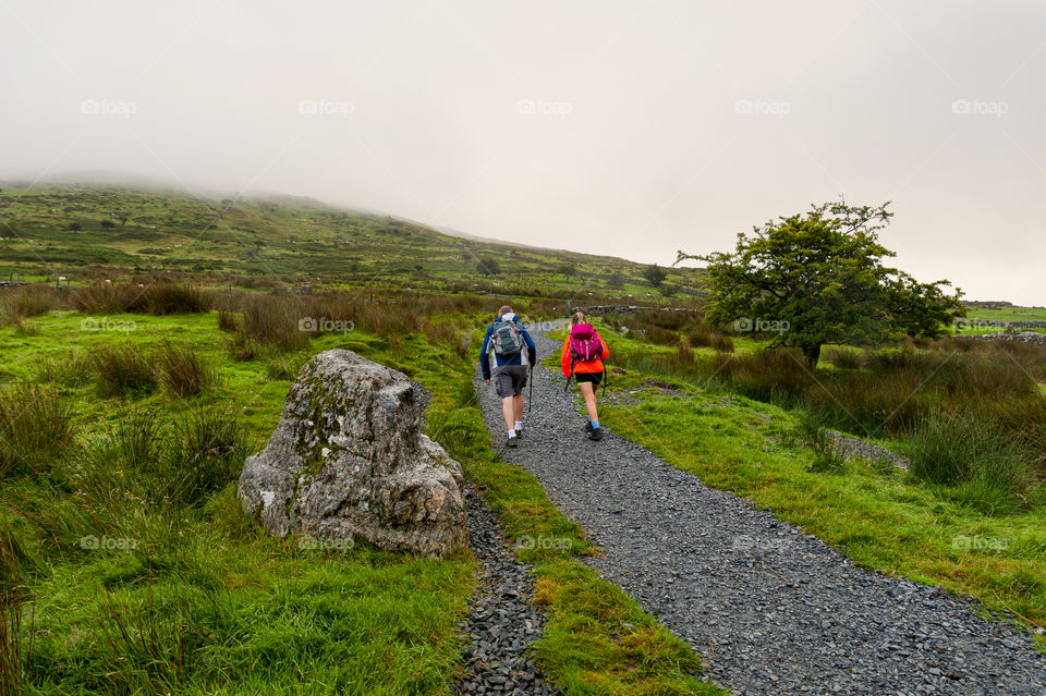 Couple trekking in the mountains.