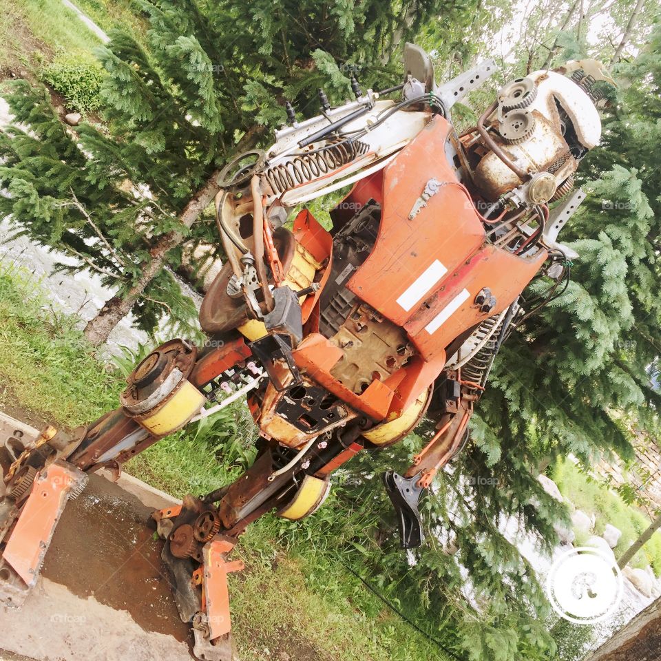 Metal rusty industrial robot 