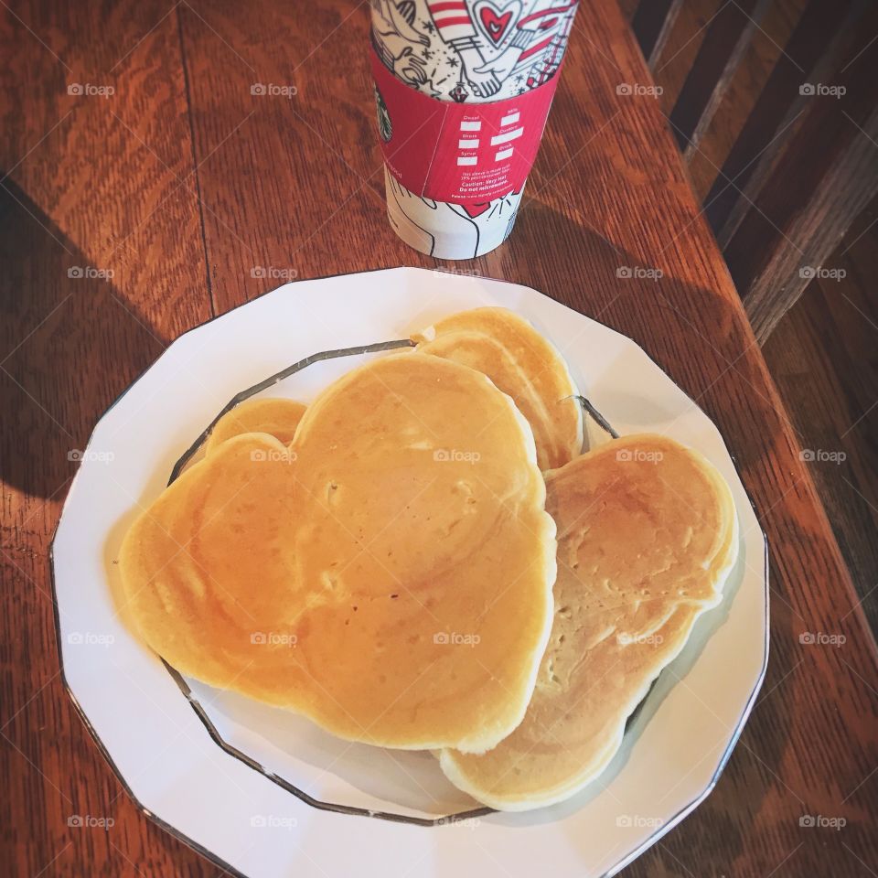 Love is waking up to heart shaped pancakes and a pumpkin spice latte. ❤️