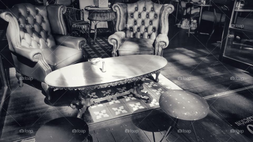 Lounge at the Coco Cubano Cafe, University of New South Wales, Sydney, Australia. A relaxing atmosphere in old Cuban setting. Monochrome version.