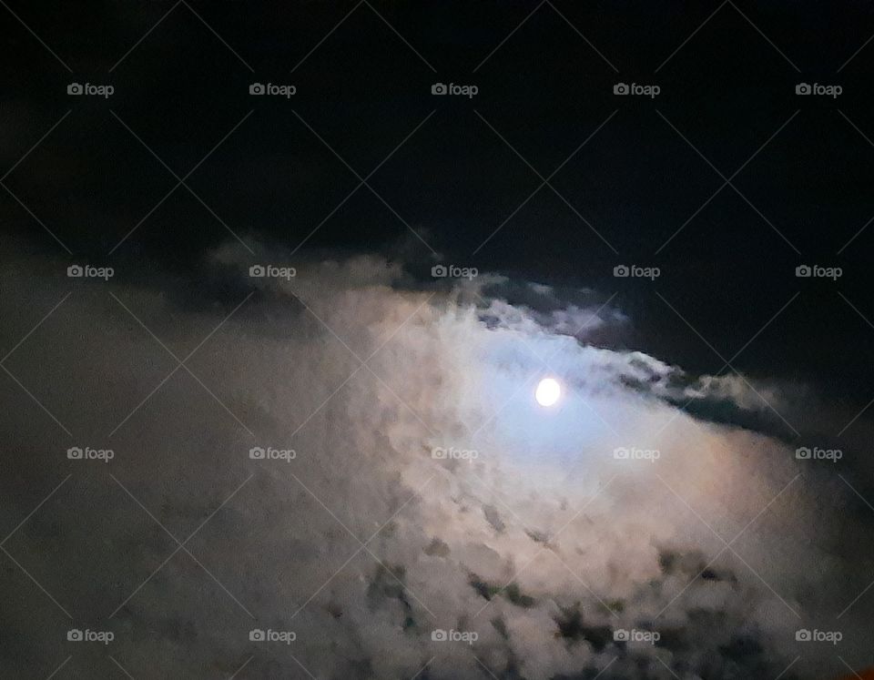 moon between clouds,moon,clouds,nature,landscape,night, evening,colorful,shining,black