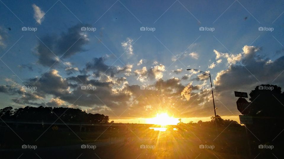 Sunset through a dirty windshield