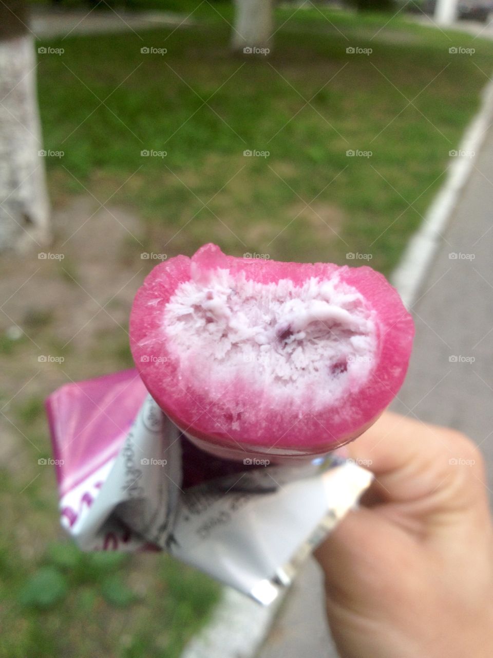 Delicious fruit ice cream in hand