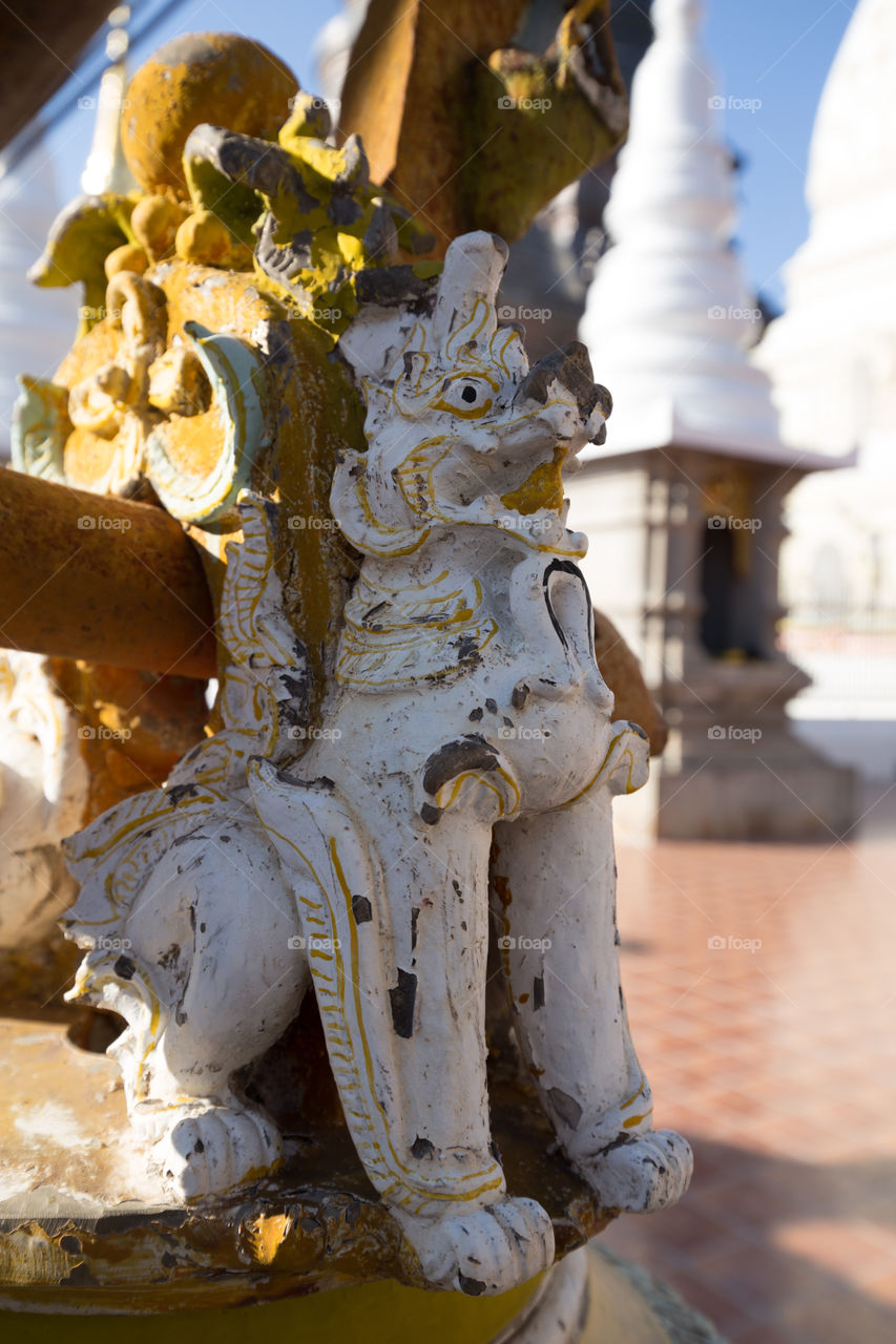 leo statue in temple Thailand 