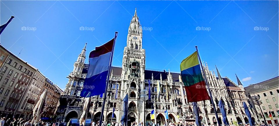 “Marienplatz” in “Munich”,capitol of “Bavaria” is the address of the historical Bavarian government and of the government today. The grandiose gothic influenced architecture has made this place a major tourist attraction. 2022. Hypnotic Productions