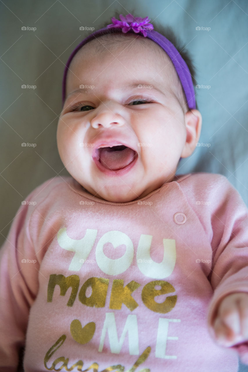 cute baby girl laughing