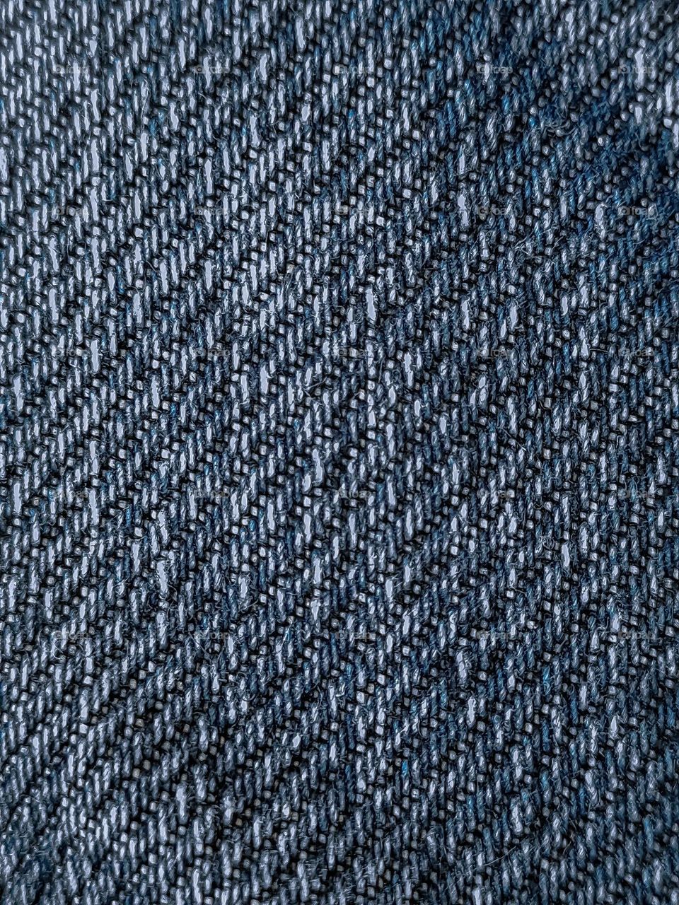 the fabric fibers from the jeans I wear are faded blue