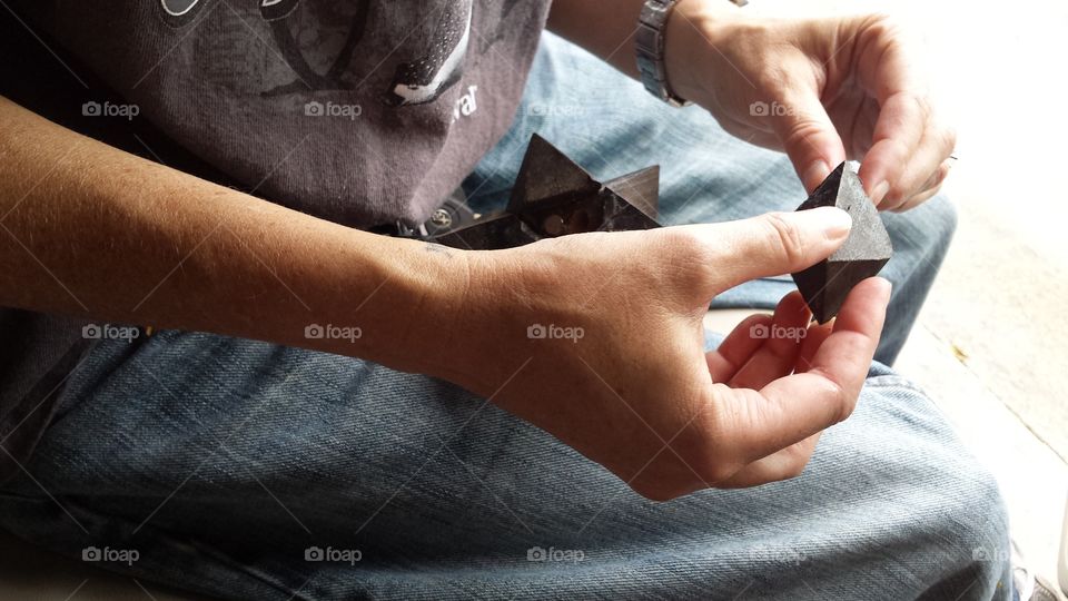 Hands at Work. taking  a puzzle apart