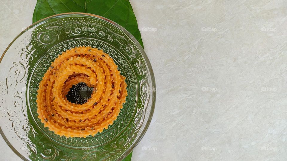 The Circle of Snacks, murukku, a snack usually made of rice or urad dal flour, formed into a twisty shape, Indian snacks
