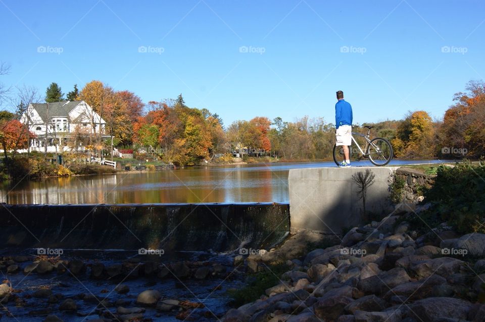 Biker enjoying the fall view . Northville Michigan 