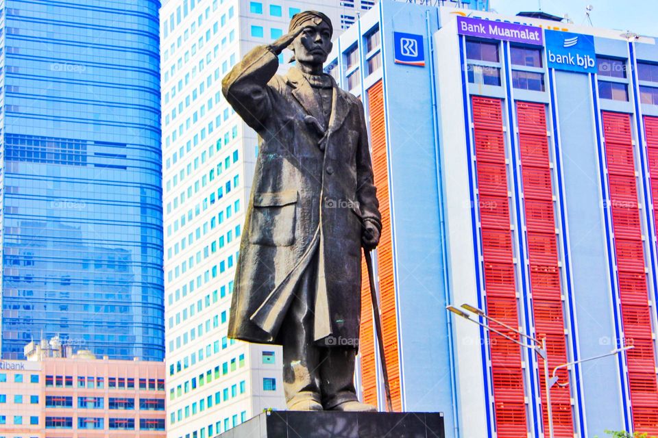 the commander in chief general sudirman monument in the middle of jakarta city.