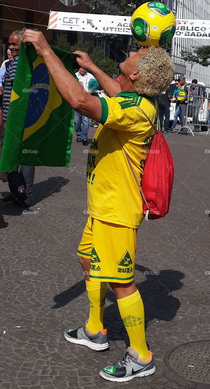 street artist. brasilian street soccer player