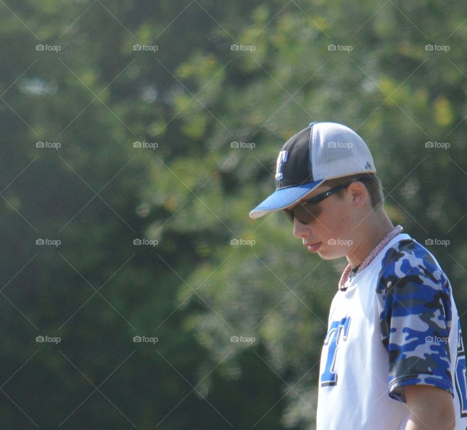 13 year old Texas baseball pitcher pre-pitch concentration. 