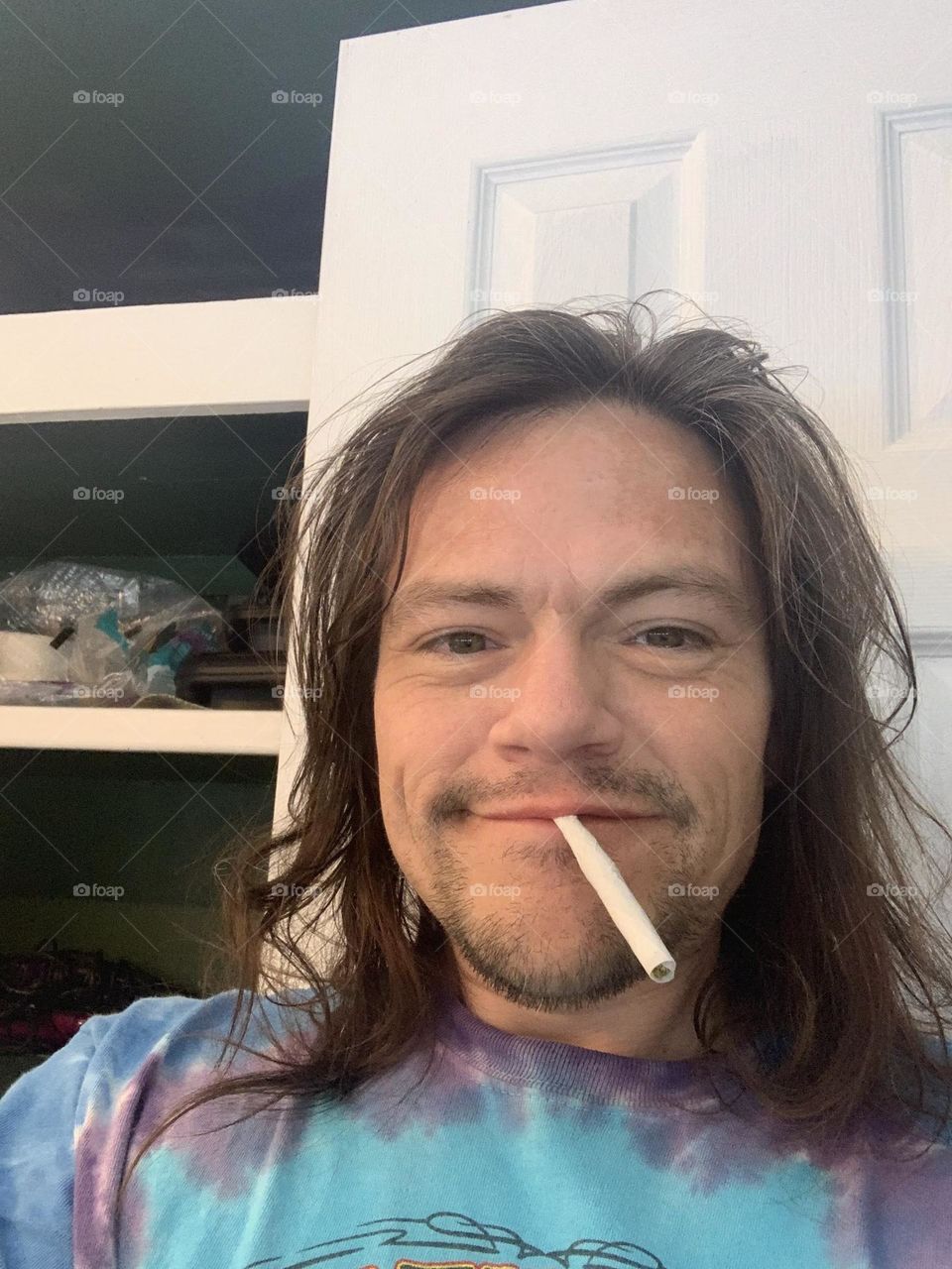 cute guy 
long haired guy with joint
stoned in the morning