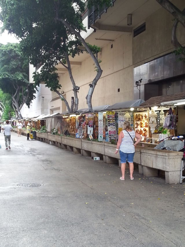 Street market. Street market, where items and people of different cultures gather with the same interests. Waikiki HI