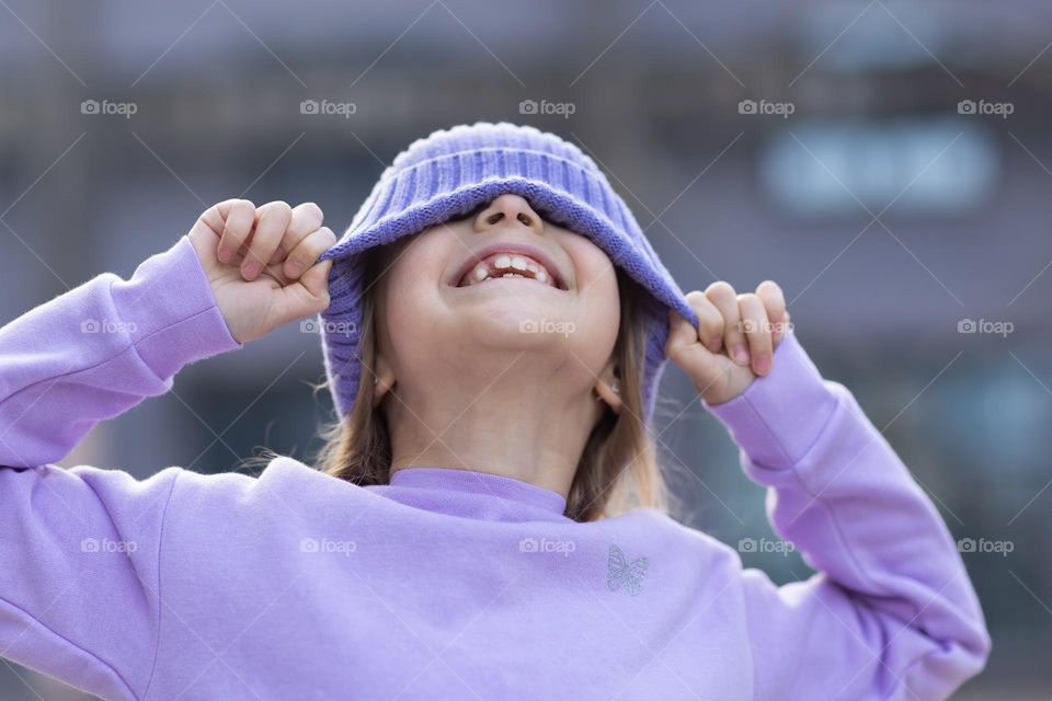 Little Caucasian girl feeling happiness outdoor 