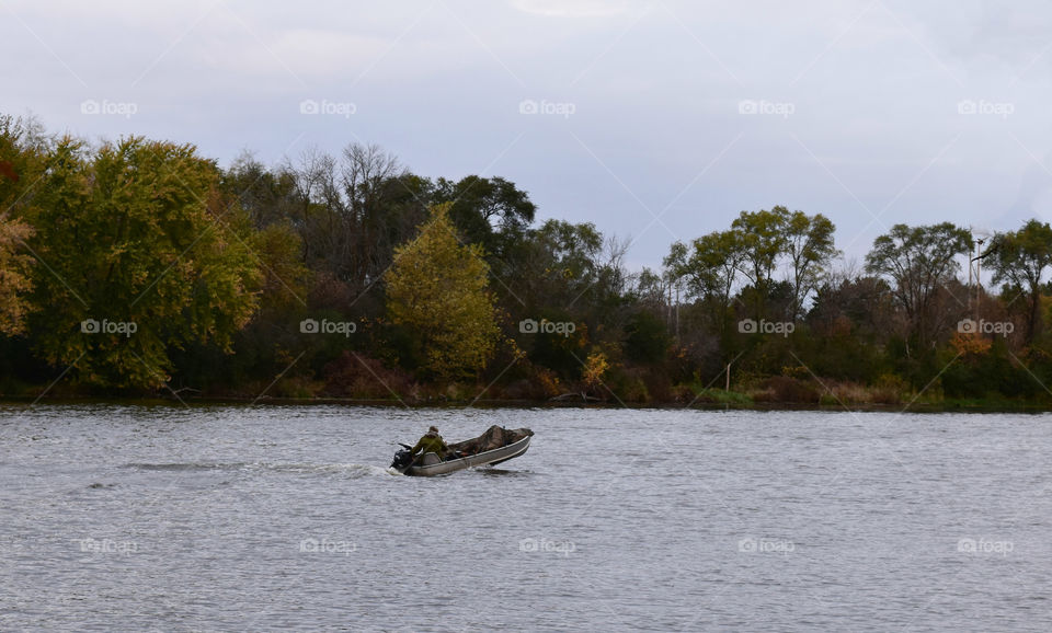 Fishing on the river on a fall morning