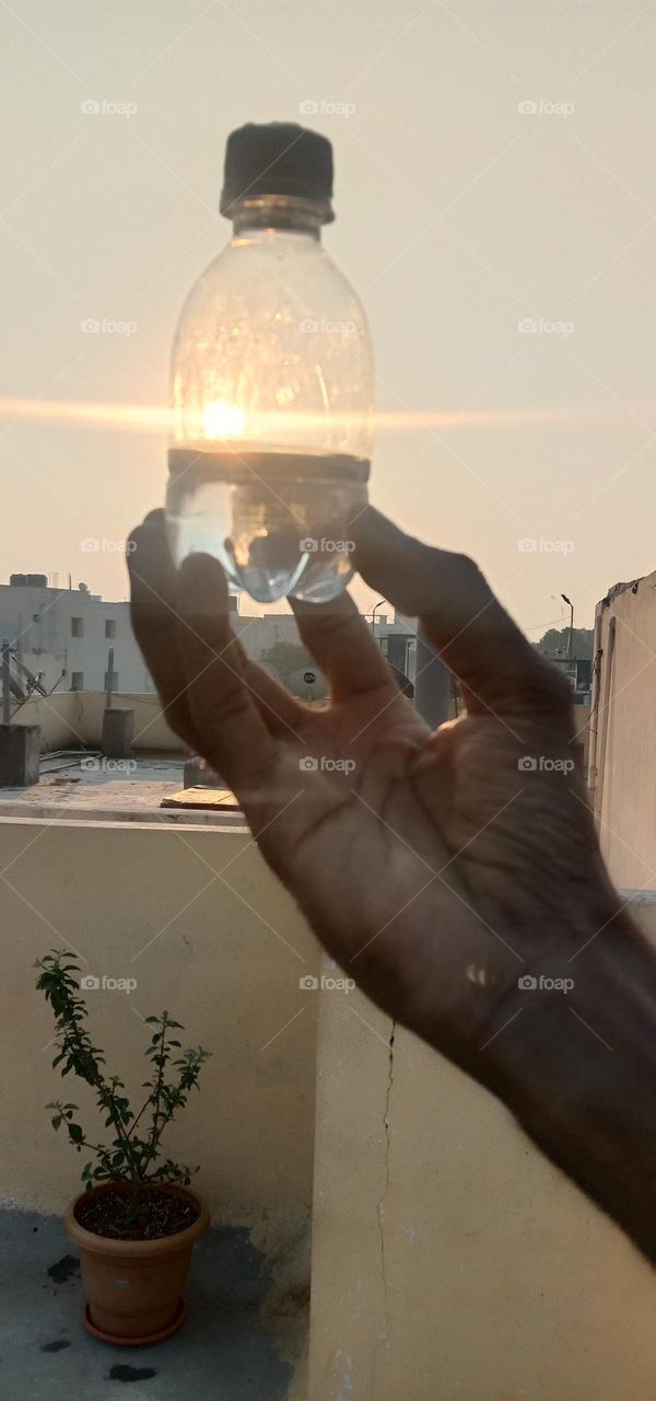 half water bottle with sun