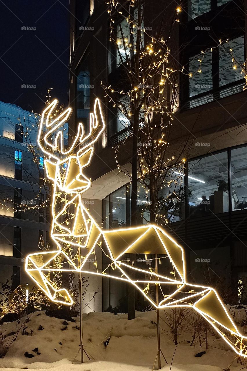 Christmas and New year decorations light street in the night city