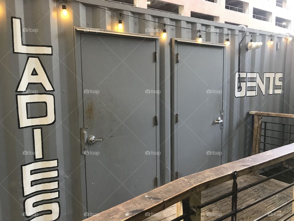 Cargo crate ladies and gents bathroom