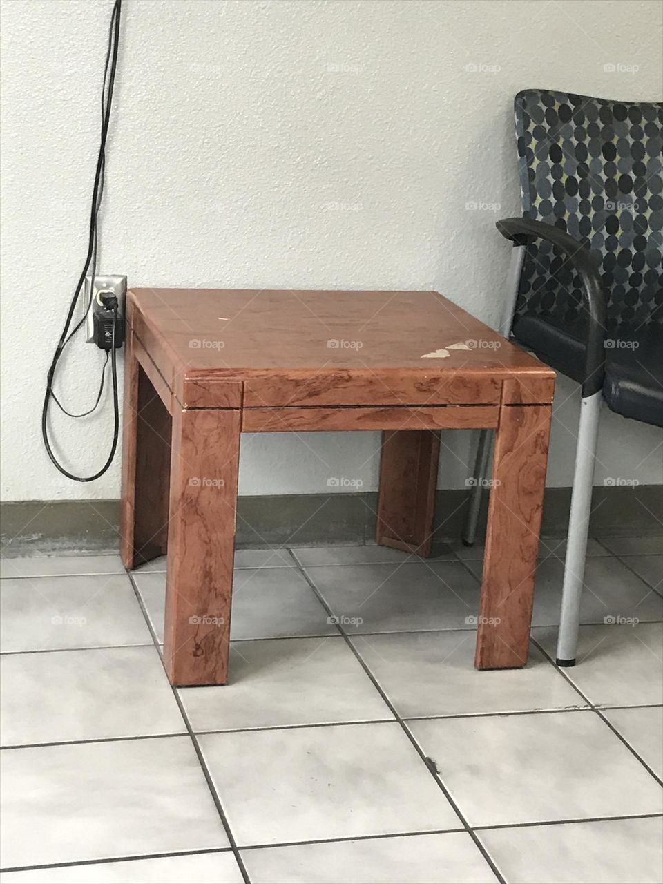 A small side table in the lobby.